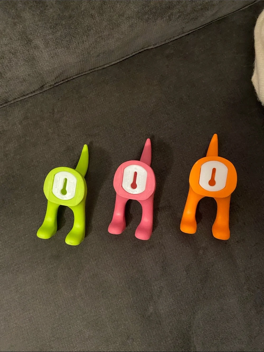 IKEA Bastis Set of 3 Dog Tail plastic Hooks in Green, Orange & Pink. Never used.